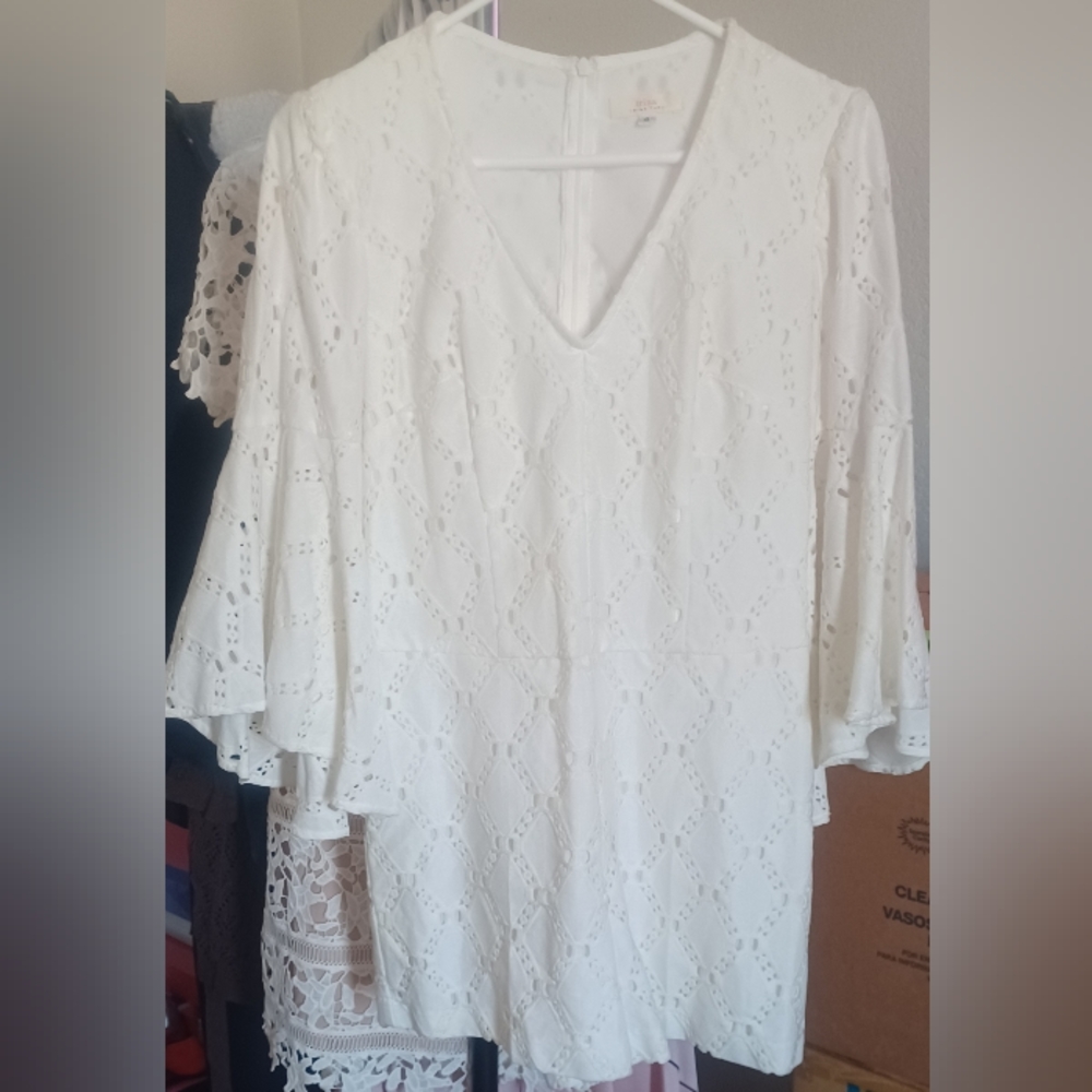 Tina Turk cream lace romper with bell sleeves. Fully lined % true to size. #355